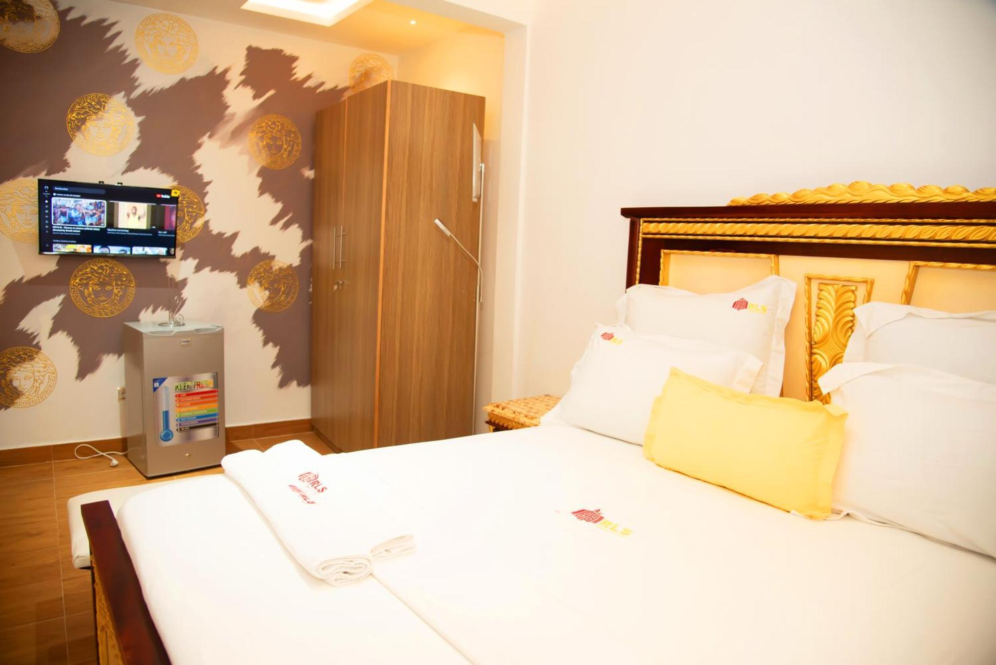 Residence Le Sommet - Chambre Versace Дуала Экстерьер фото